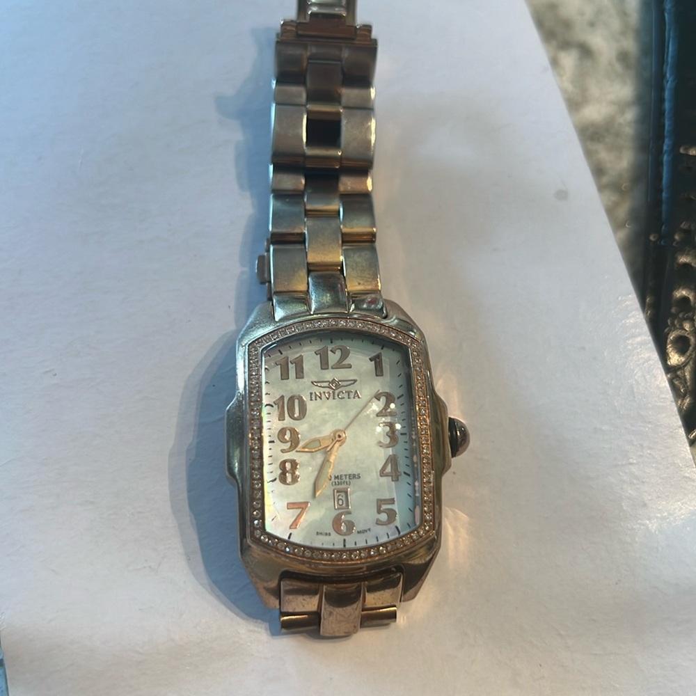 Rose gold women’s watch need battery Invicta wildflower